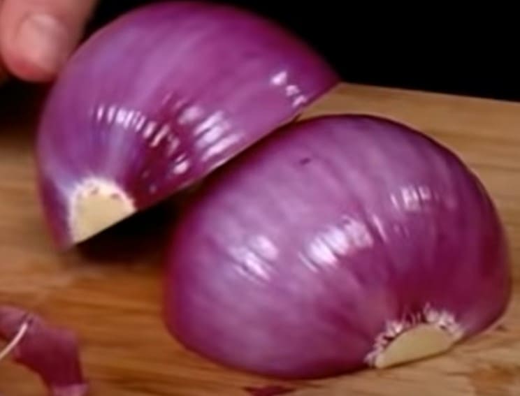 Cut the peeled onions into two
